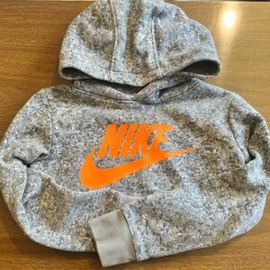 Kids Grey Nike Hoodie featuring Orange Nike Symbol
